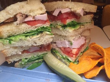 Turkey club on homemade bread with homemade chips